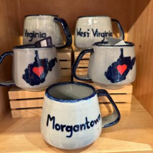 Locally made, Morgantown ceramic mugs inside River Fair Trade.