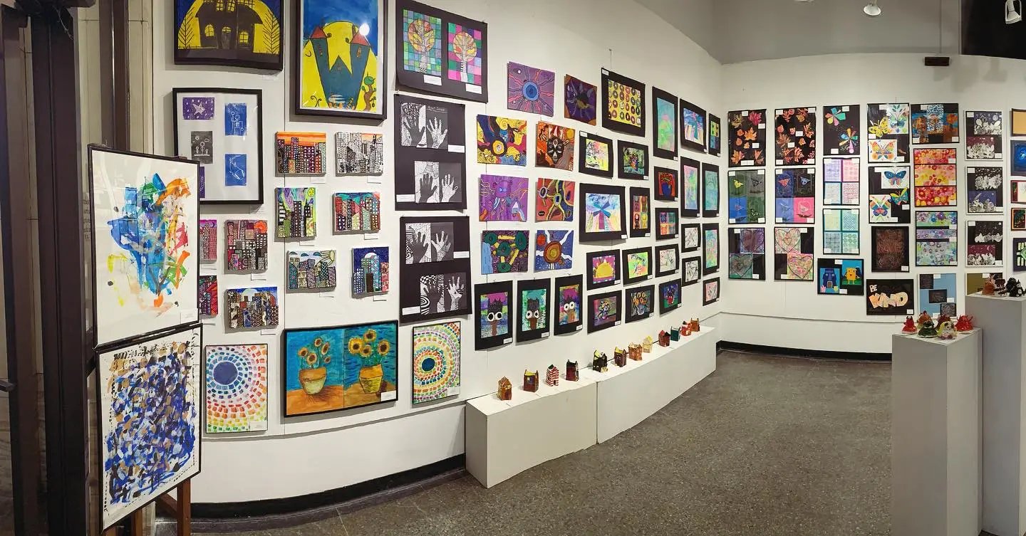 Pictures of art on a wall.
